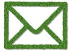 Icon of an envelope in lush green grass